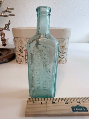 Aqua Embossed Vintage Glass Medicine Bottle